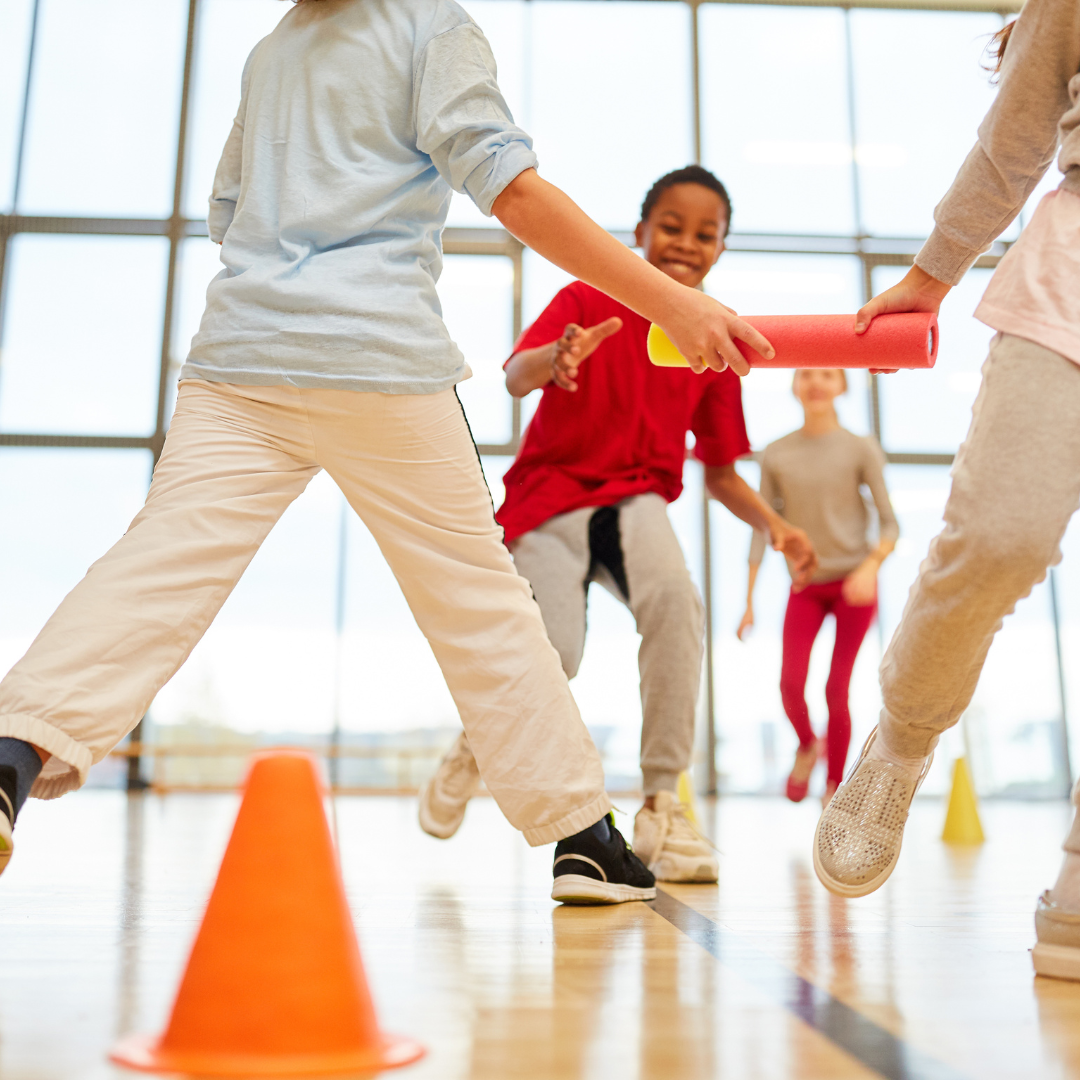 Children's fitness group participating in a fun and interactive exercise session, promoting physical activity and healthy lifestyle habits