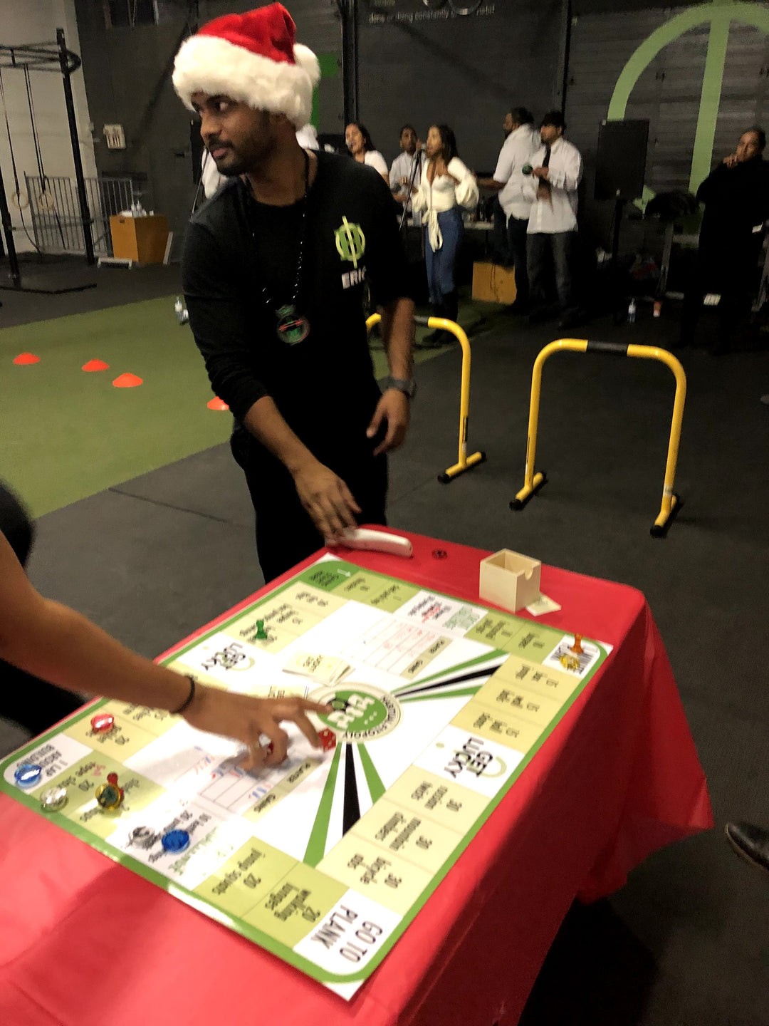 Founder Eric with Poster Version of Boardgains - The Intermediate Stage