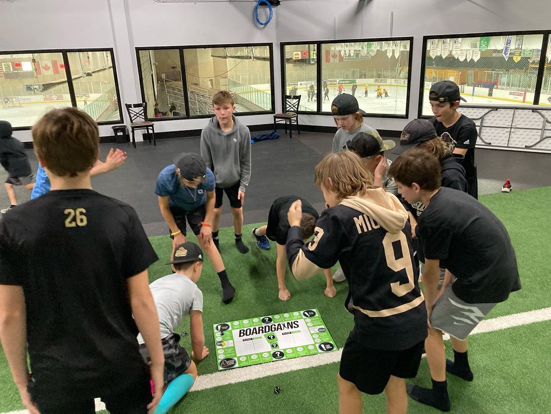 Group of Hockey Kids Playing Boardgains - Integrating Fitness into Sports Training