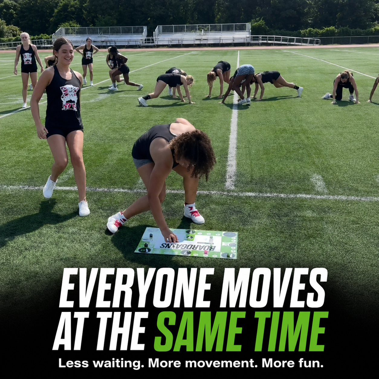 Outdoor group fitness class on a green athletic field, with several women performing synchronized exercises on mats. Large overlaid text reads 'EVERYONE MOVES AT THE SAME TIME' with smaller text below.